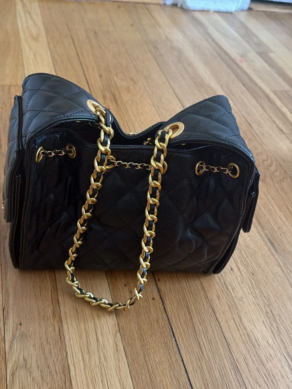 CHANEL 25 Black Quilted Shoulder Drawstring Bag with Gold Hardware